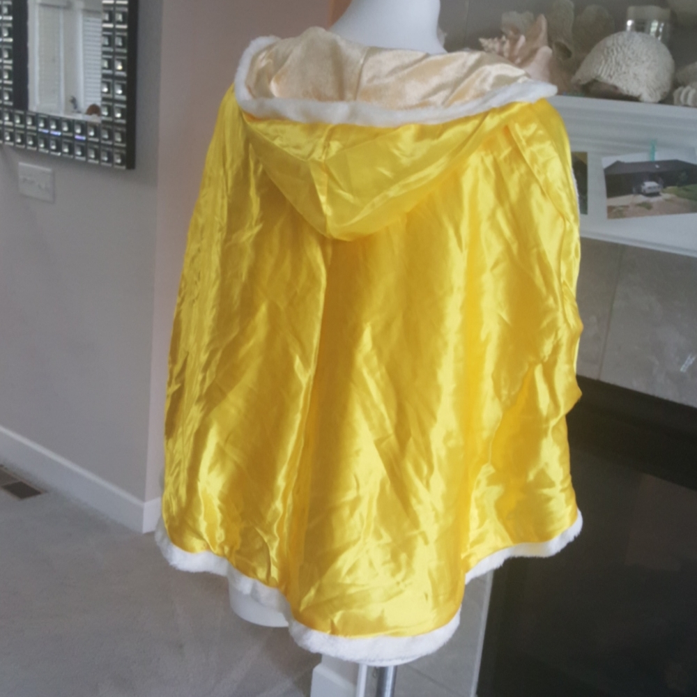 Yellow hooded cape.